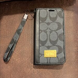 Coach Signature Canvas Folio Phone Case in Black with Gold Plaque
